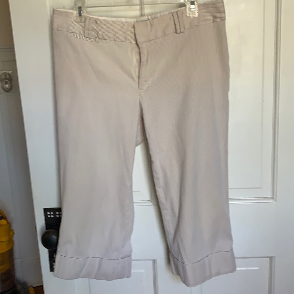 Capri pants with white and tan pinstripes